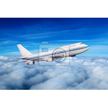 Фотообои с самолетом над облаками