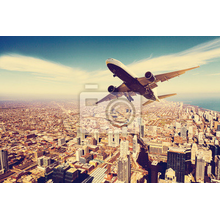 Фотообои - Самолет над мегаполисом
