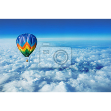 Фотообои с воздушным шаром над облаками